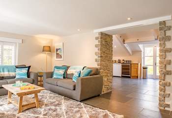 The living-room leads through from the kitchen/dining-room.