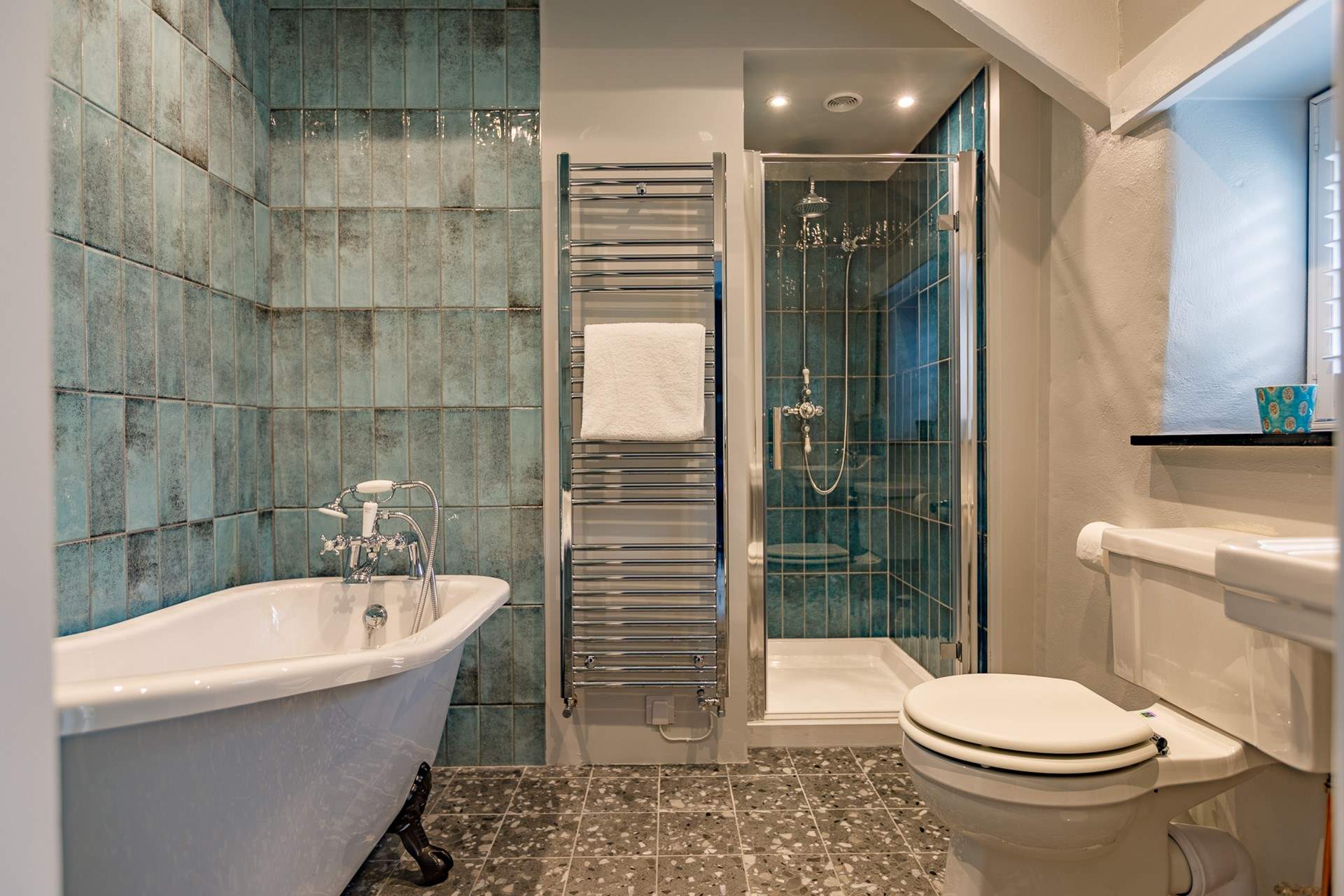 Bedroom One has an incredibly stylish ensuite .
