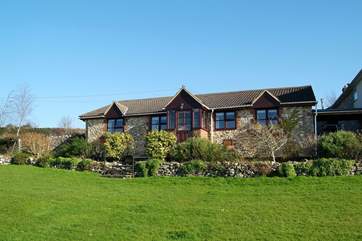 This is the front of the cottage, taken from the lovely garden that you can enjoy during your stay.