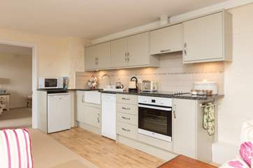 There is a contemporary kitchen which is very well-equipped.