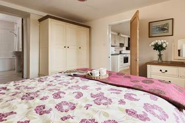 This bedroom is at one end of the cottage and the other bedroom is at the opposite end - so you will have plenty of privacy.