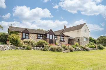 This is the front of the cottage, taken from the lovely garden that you can enjoy during your stay.