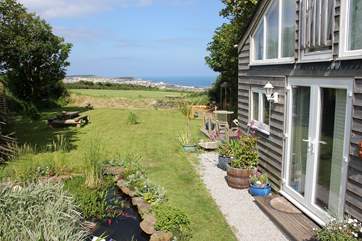 The Summer House is detached and has sea views.