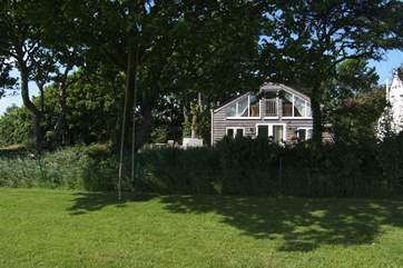 Looking through to The Summer House from the owners' fields (guests are welcome to explore and meet the animals).