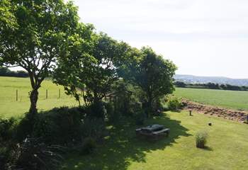 Looking across the garden to the sea from the bedroom.