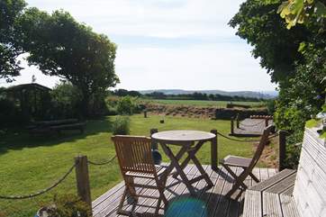This deck area is directly outside the cottage, perfect for breakfast and morning coffee.