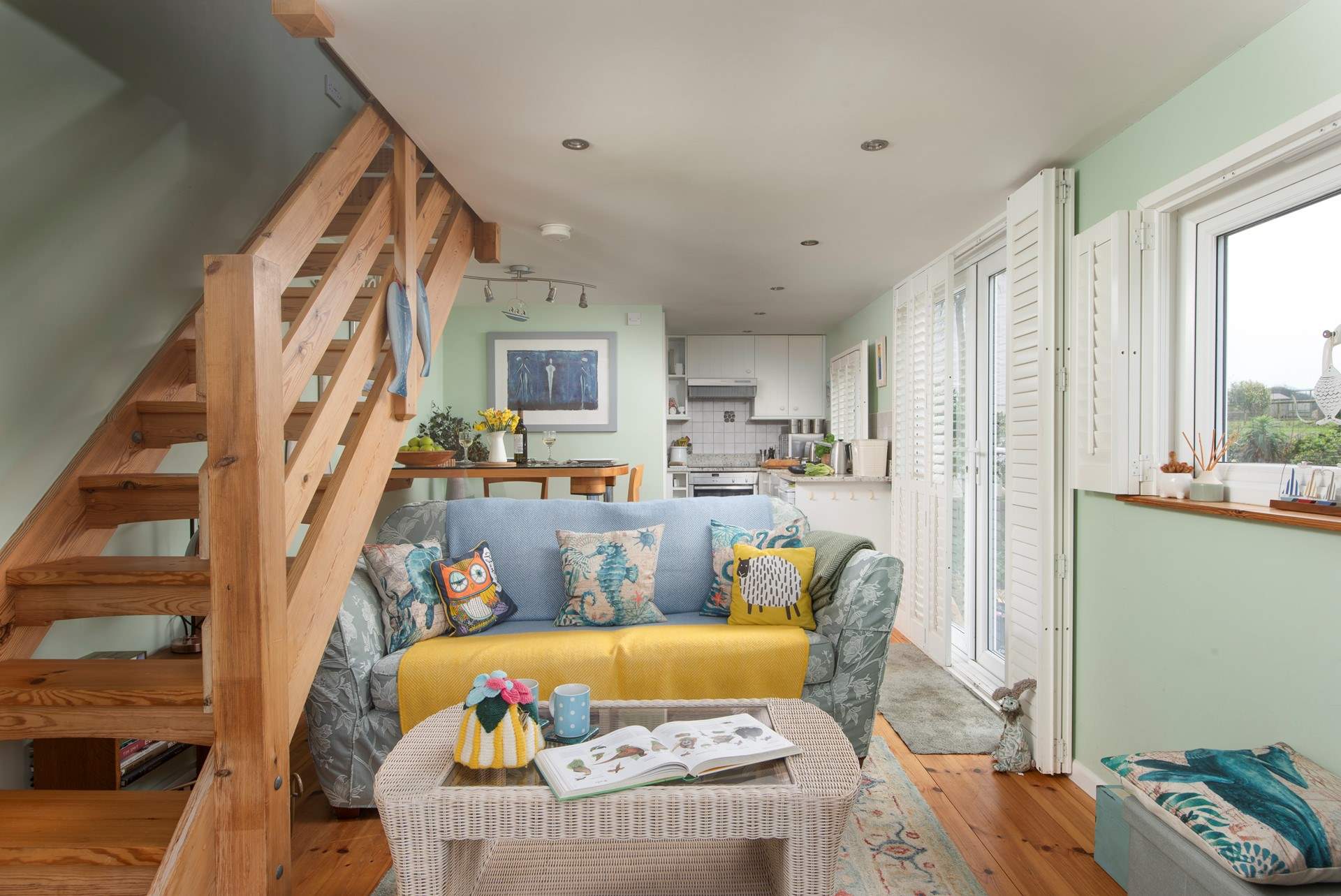 Stairs lead to the bedroom on the first floor. 