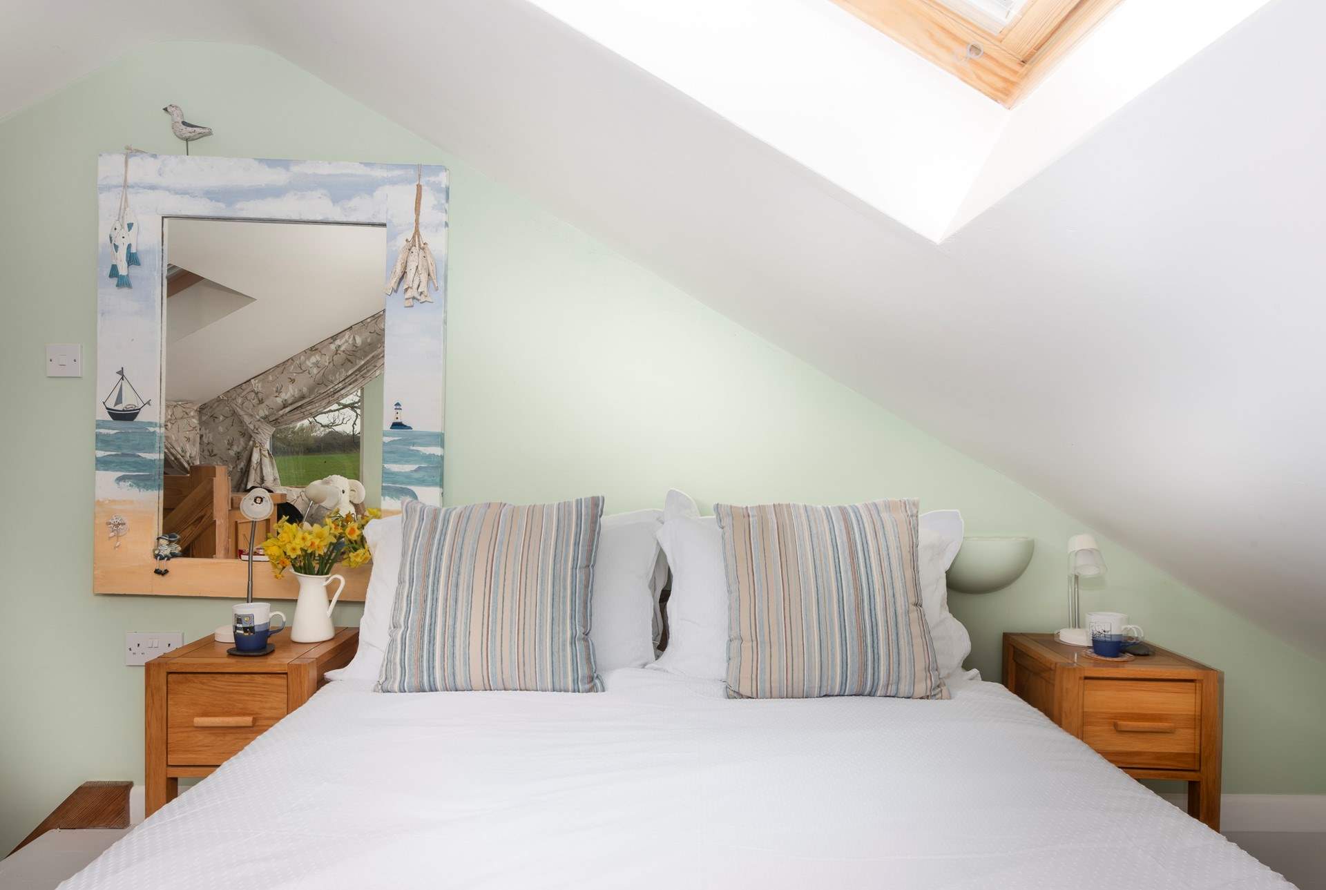 Snuggle up in bed with a cup of coffee looking over the verdant countryside. 