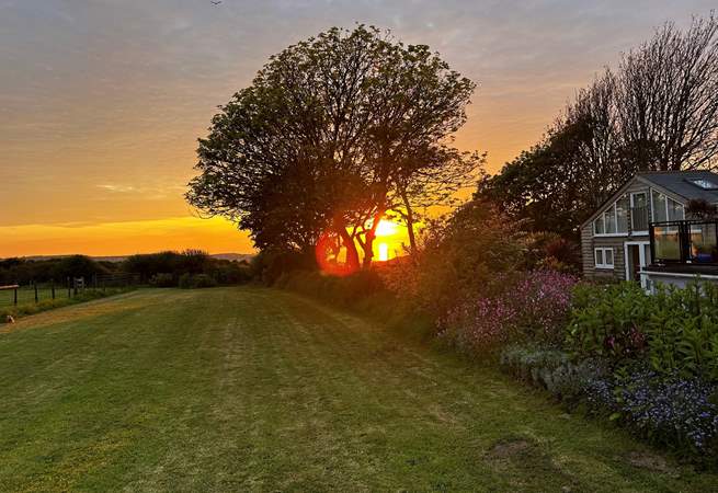 Looking through to The Summer House from the owners' fields (guests are welcome to explore and meet the animals).