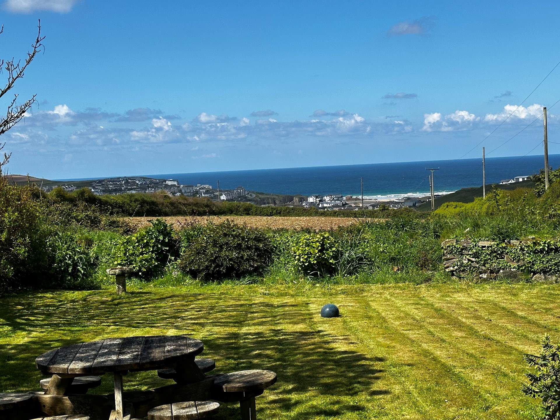 Enjoy a glass of wine at the end of the garden waiting for the sunset. 