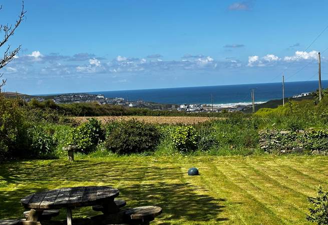Enjoy a glass of wine at the end of the garden waiting for the sunset. 