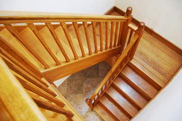 The solid oak staircase leading up to bedroom 2 and the sitting-room.