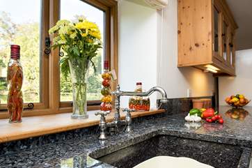 Gorgeous granite work surfaces and sink.
