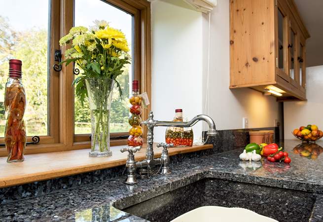 Gorgeous granite work surfaces and sink.