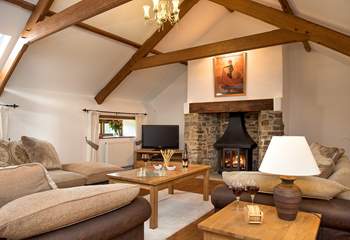 The very spacious sitting-room is situated on the first floor and has a gorgeous wood-burner making this an ideal retreat all year round.