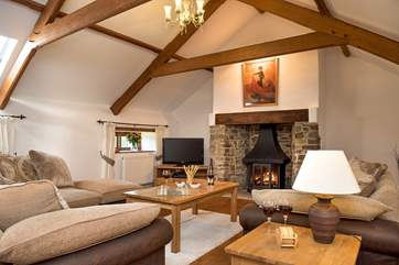 The very spacious sitting-room is situated on the first floor and has a gorgeous wood-burner making this an ideal retreat all year round.