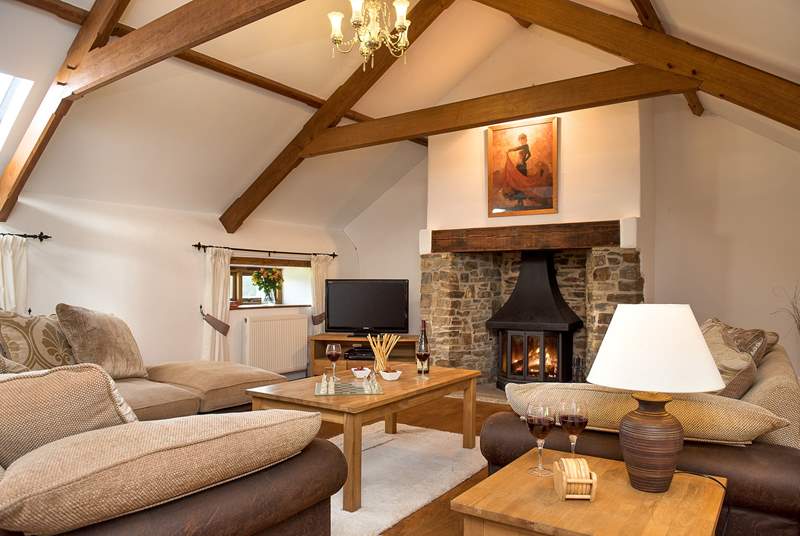 The very spacious sitting-room is situated on the first floor and has a gorgeous wood-burner making this an ideal retreat all year round.
