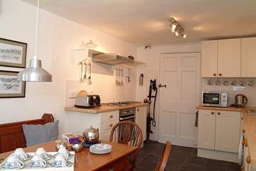 There is an original (disused) water pump in the kitchen/diner, contrasting quaintly with the modern appliances.