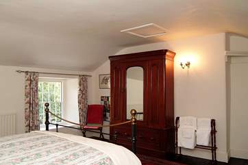 All three bedrooms look out over the cottage garden to the front.