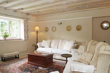 The sitting-room is spacious and light.