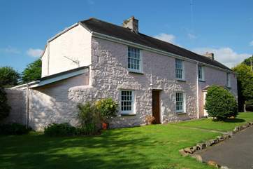 Count House Cottage (on the left) adjoins the owners' home (right).