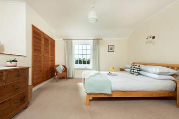 The bedroom is very spacious and light.