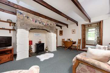 The sitting/dining-room may be small but is very cosy.