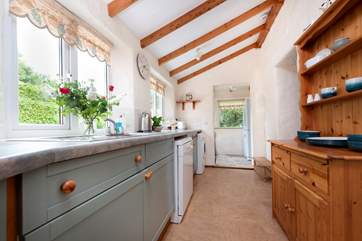 The kitchen is light and airy and has lots of cupboard space.