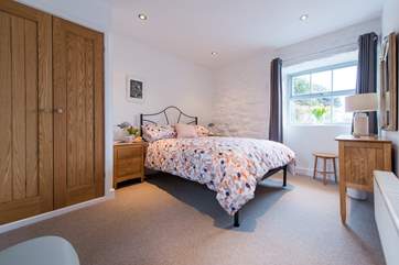 The comfortable double bedroom.