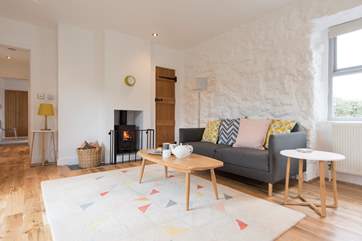 Relax in front of the roaring wood-burner.