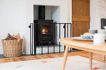 Keep warm in front of a roaring wood-burner.