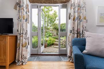 From the living room you can head out to the glorious garden.