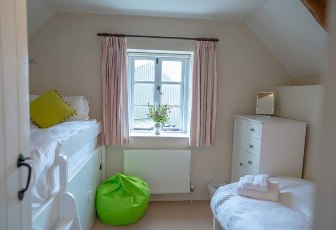 The twin bedroom has two 3ft beds with space to play and relax.
