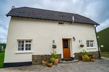 Cherryblossom Cottage sits to one side of the courtyard with parking to the side and a beautifully secluded garden to the rear.
