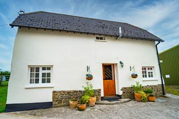 Cherryblossom Cottage sits to one side of the courtyard with parking to the side and a beautifully secluded garden to the rear.
