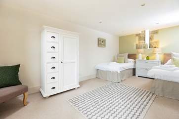 The family bedroom is luxurious and spacious.