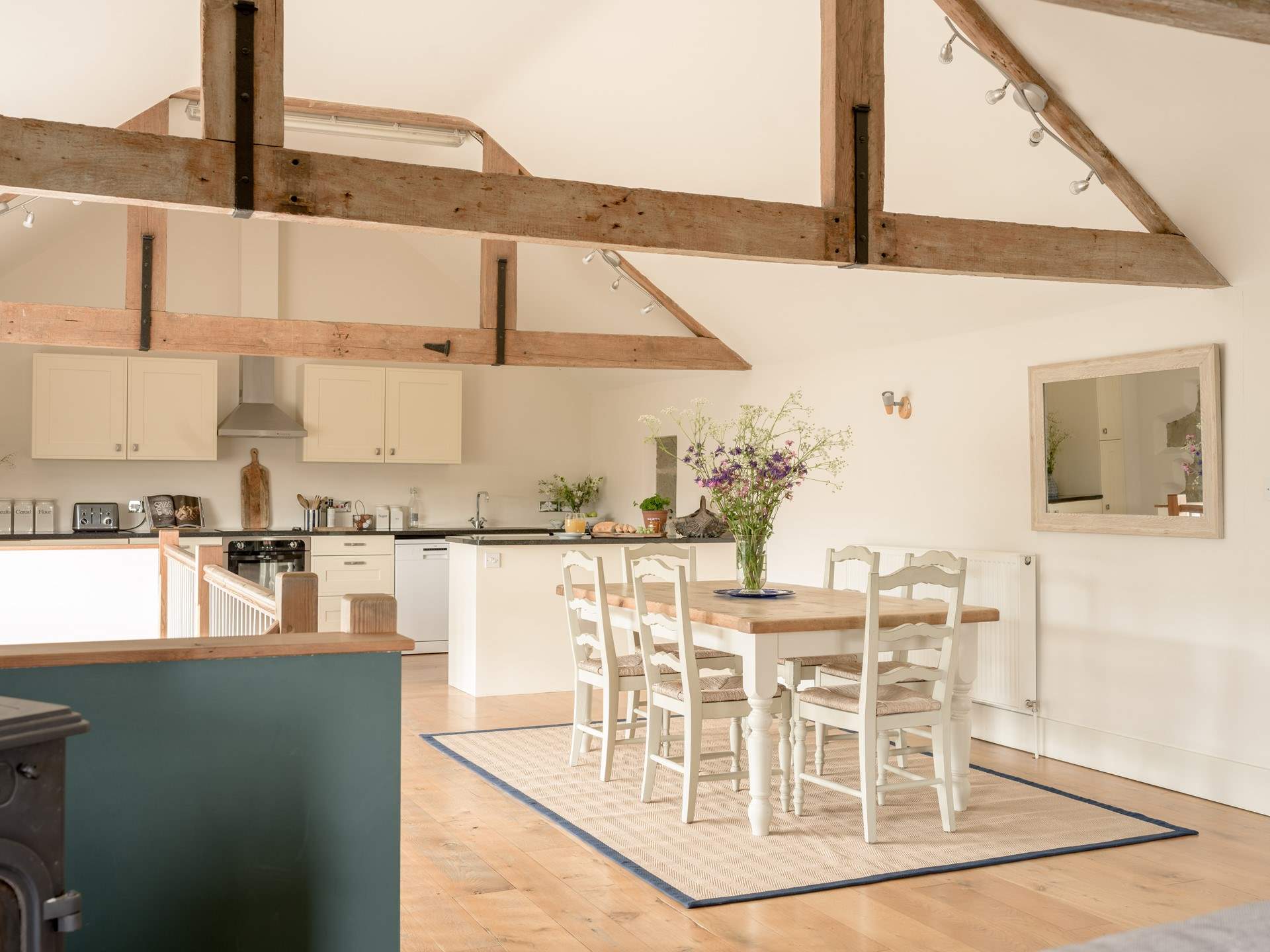 The dining space connects the kitchen and sitting room and makes for a wonderful space to gather.