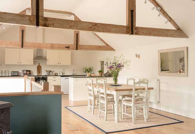 The dining space connects the kitchen and sitting room and makes for a wonderful space to gather.