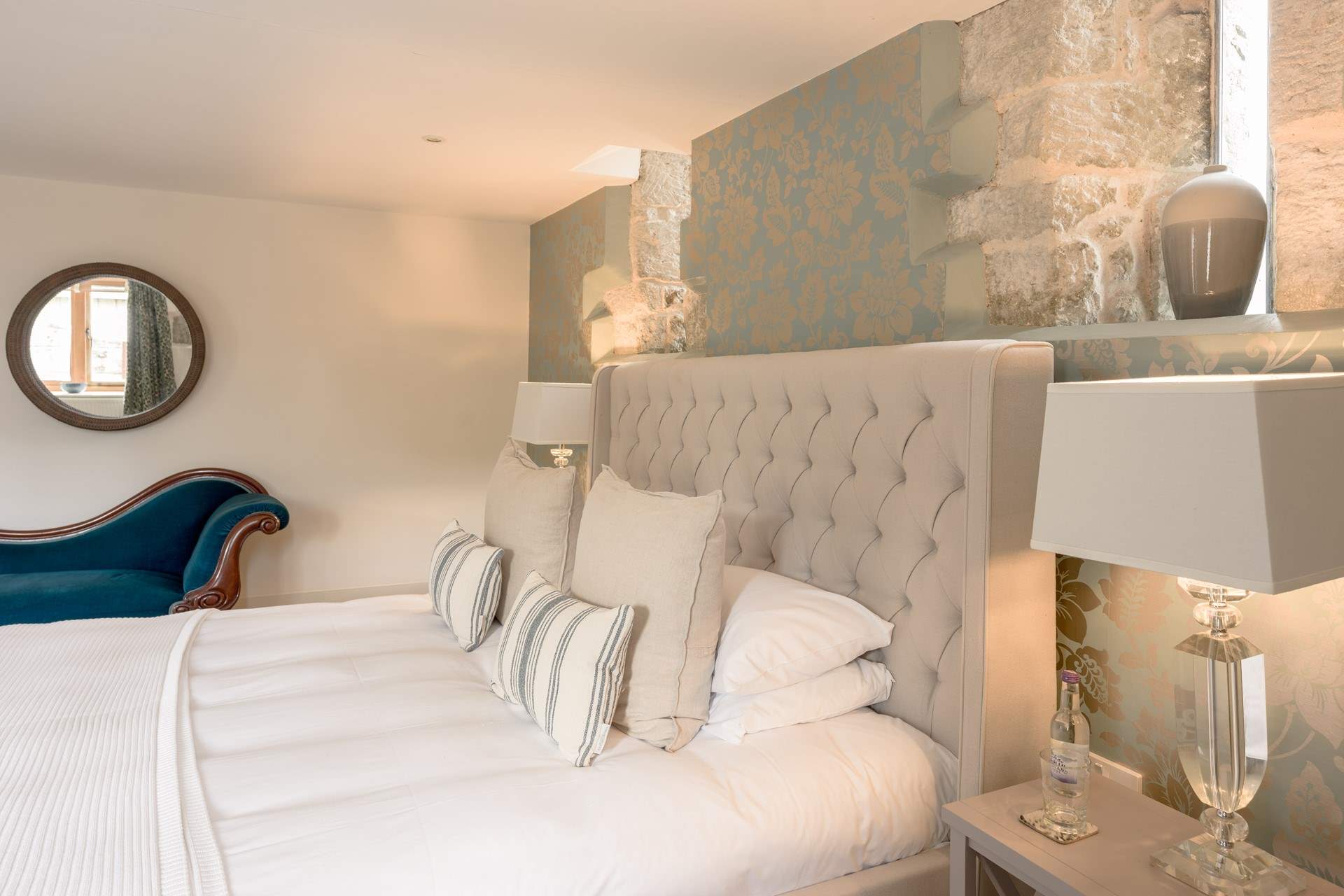The primary bedroom features a sumptuous super king bed as well as plenty of storage and an en-suite shower room.