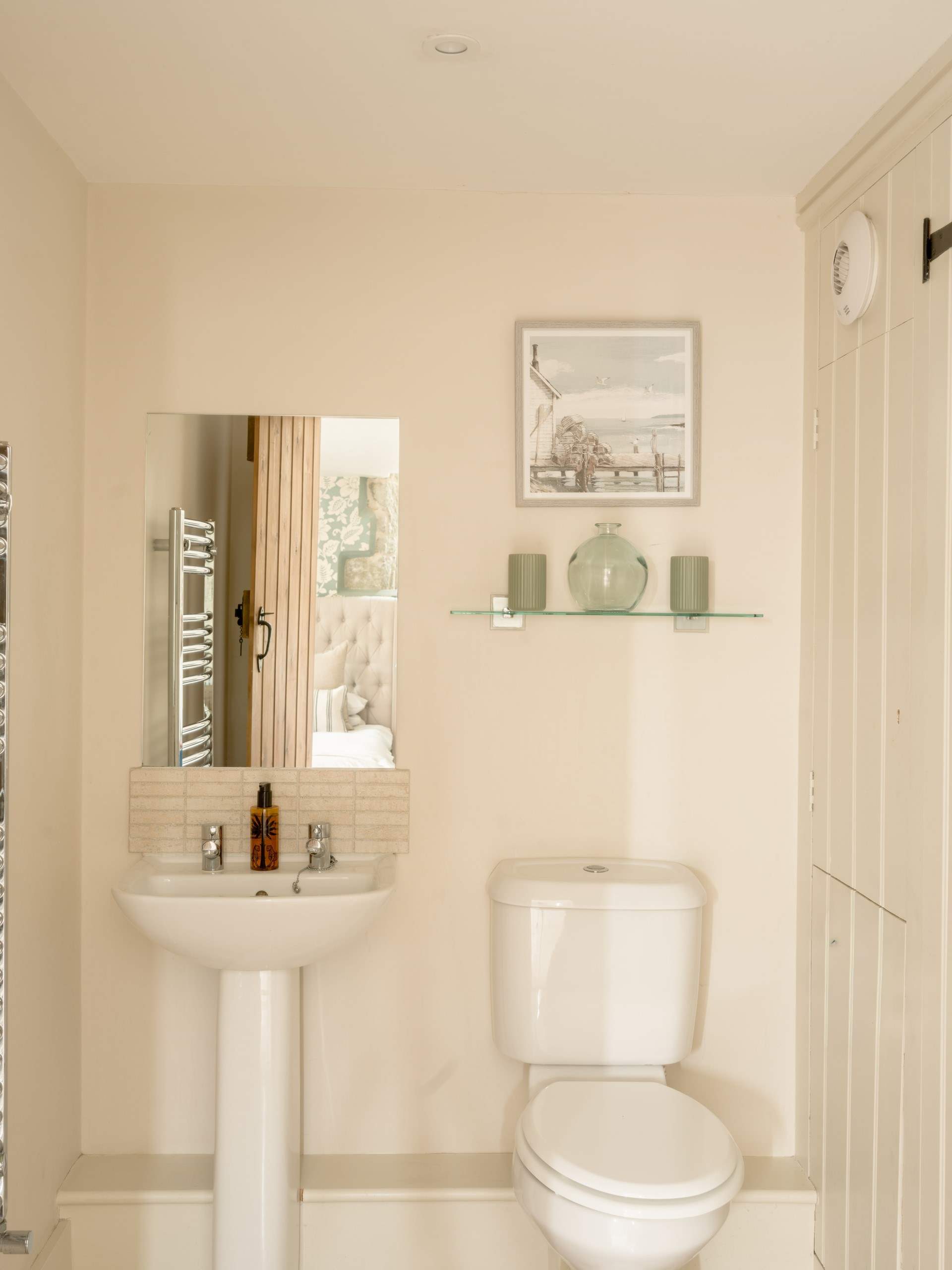 The en-suite shower room with shower enclosure.