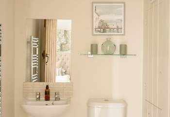 The en-suite shower room with shower enclosure.