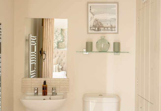 The en-suite shower room with shower enclosure.