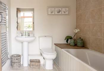 The family bathroom joins the two bedrooms on the ground floor.