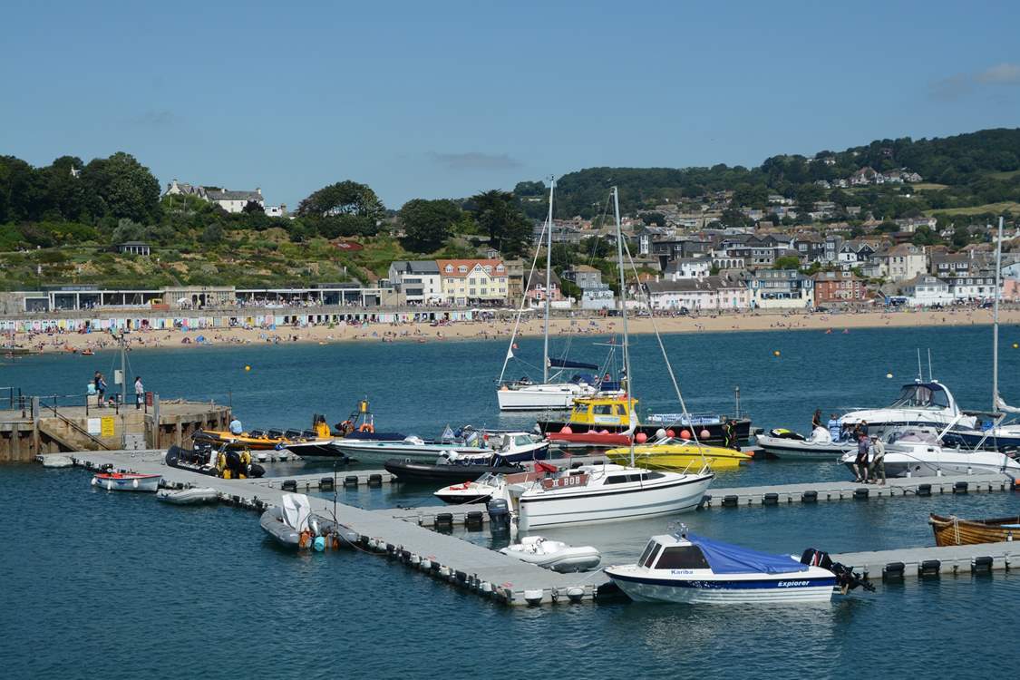 Lyme Regis has plenty going on all year round, fossil history, the iconic Cobb, a lovely beach with summer watersports and lots of shops and delicious places to eat.