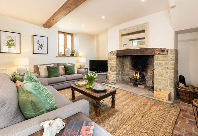 The open fire adds cosy character to this lovely cottage.