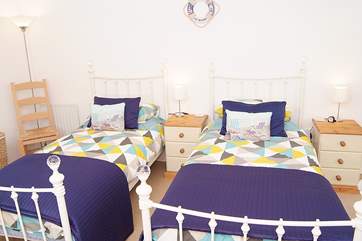 The twin bedroom is at the back of the apartment.