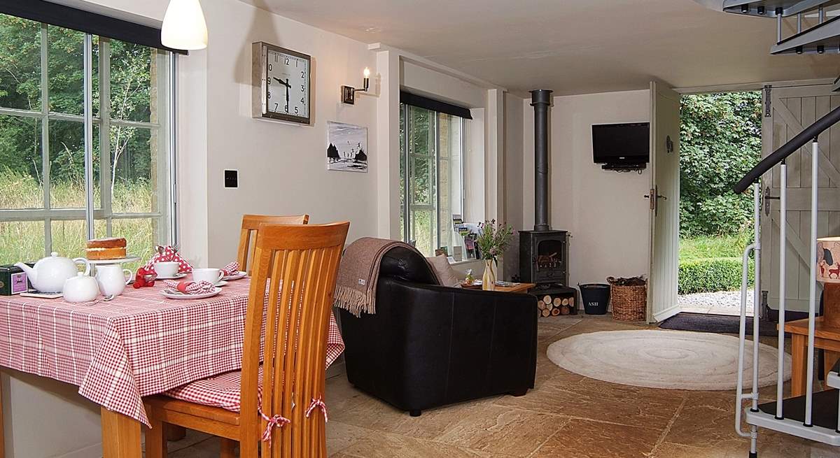 Looking across the living-area from the other direction. There is a wood burning stove for cosy evenings in.