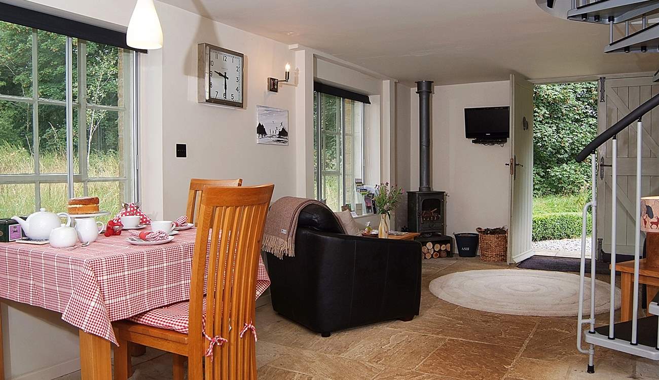 Looking across the living-area from the other direction. There is a wood burning stove for cosy evenings in.