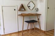 This cleverly designed dressing table with storage and a make-up mirror is a great addition to the bedroom