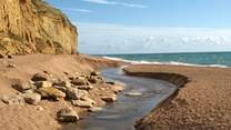 This is the dramatic Jurassic Coast at Burton Bradstock, beyond West Bay at Bridport.